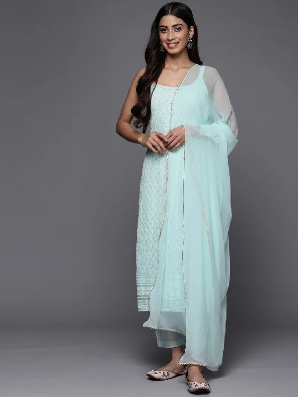 Varanga light blue spaghetti strap kurta with bottom and dupatta.